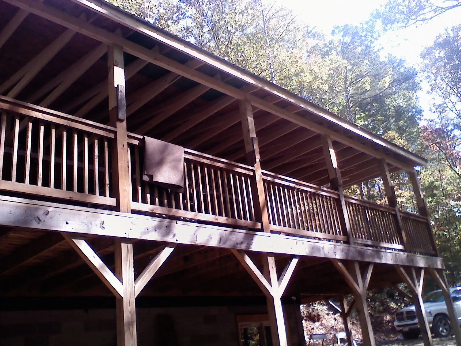Timber framing under a new elevated porch and deck — Roof Leak Repair in Shaniko by Roofing Brothers